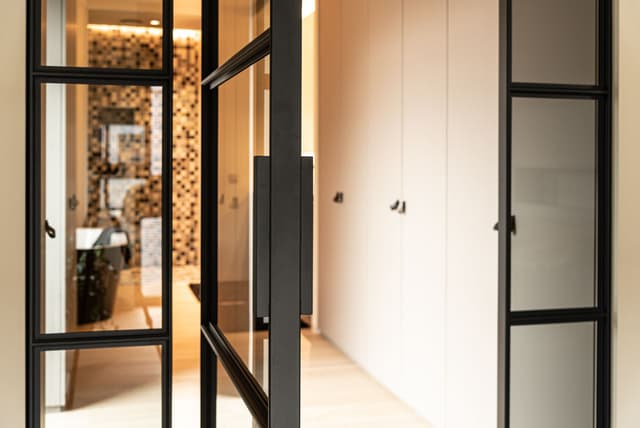 pivoting steel glazed doors in a high-end luxury residential project