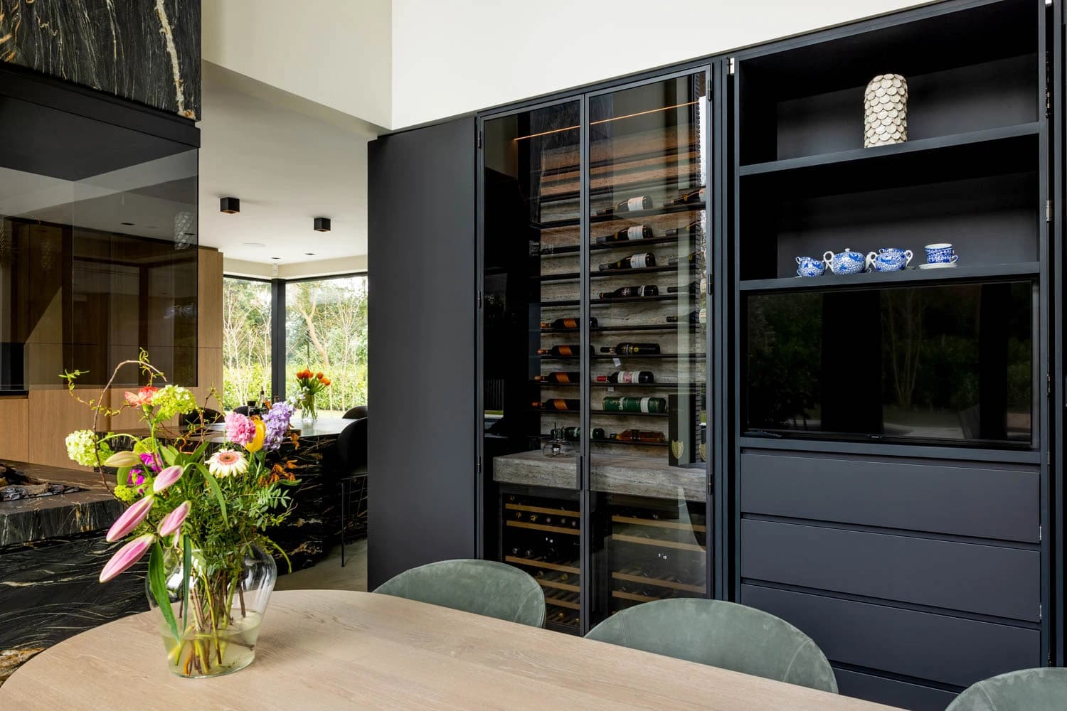 inbuilt steel glazed wine storage in a contemporary kitchen
