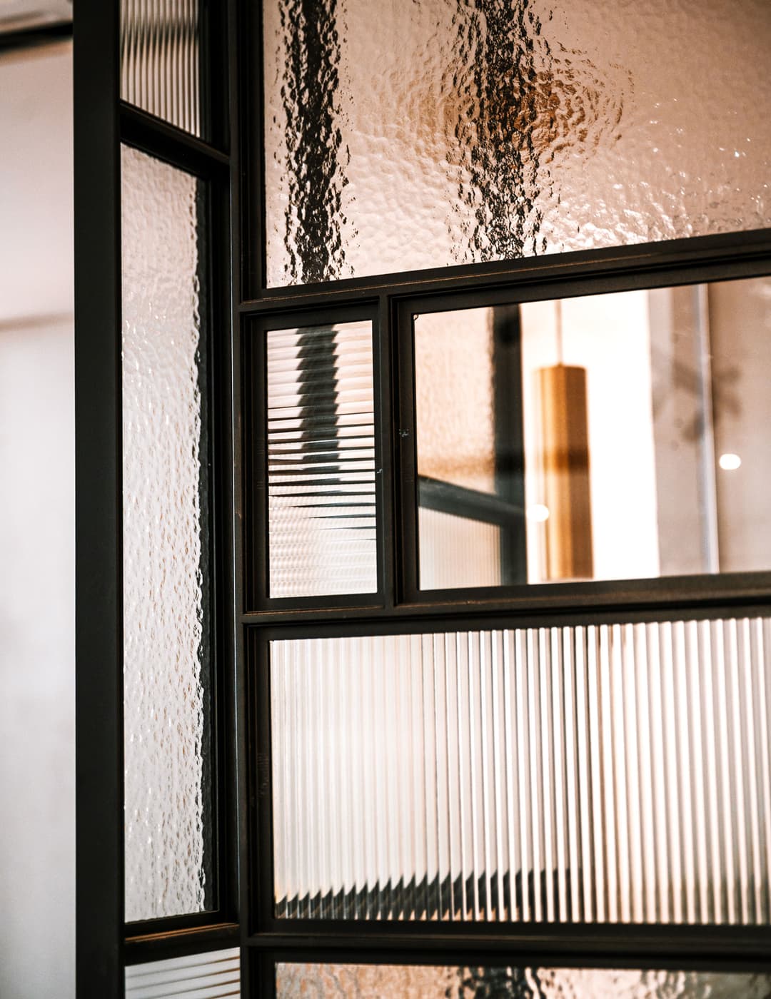 textured glass in black steel doors in the Envo Solutions showroom in London, UK