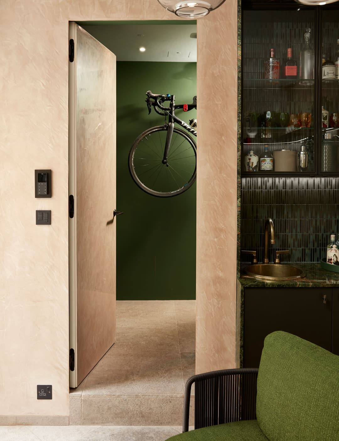 flush invisible jib door with a polished plaster finish